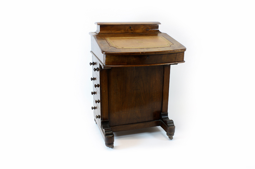 A walnut veneered Victorian Davenport with floral marquetry, of typical form with open top to the