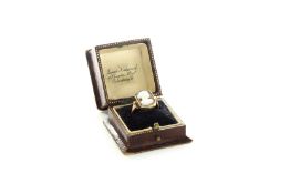 A 9ct gold ring set with cameo of a classical female figure, in rectangular shaped setting, size ‘M’