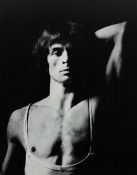 A black and white photographic print of Rudolf Nureyev, 36 x 28cm