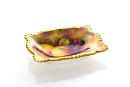 A Royal Worcester painted pin tray by Albert Shuck, dated 1932, of cushion shape and painted with