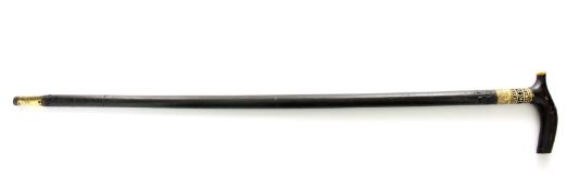 An Indian swordstick, with ebonised handle, shaft and carved bone collar. Blade engraved ‘India’,