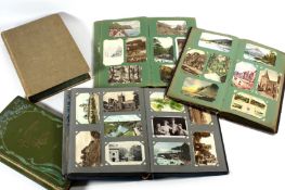 A large collection of early/mid 20th century postcards in five albums, Subjects including landmarks,