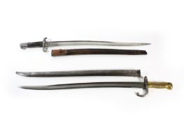 Two Yataghan bayonets, An 1866 pattern French Chassepot bayonet with brass hilt and steel scabbard