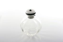 A Liberty & Co. silver topped perfume bottle, hallmarked Birmingham 1911, the silver top with