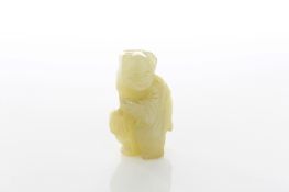 A Chinese carved jade pendant of a scholar, late 19th century, 5cm high