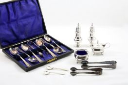 A silver plated Mappin & Webb cruet set, together with two pairs of silver sugar nips and a set of