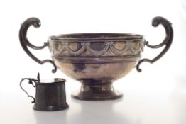 An Edwardian silver rose bowl, hallmarked London 1906, with twin scrolled handles, the bowl