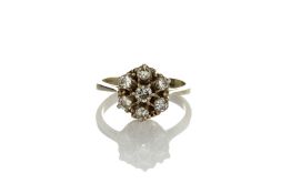 A Modern 18ct white gold diamond cluster ring, set with seven diamonds with coronet setting, ring