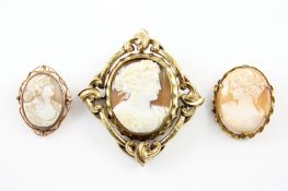 Three cameo brooches, two of classical ladies and another, the larger in Victorian pinchbeck