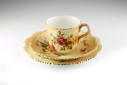 A Victorian Royal Worcester blush ivory trio, dated 1898 decorated with flowers and leaves, with