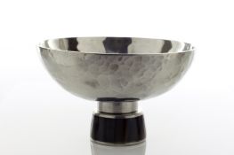 An Austrian Art & Crafts style hammered silver stem cup, mid 20th century, the bowl of broad