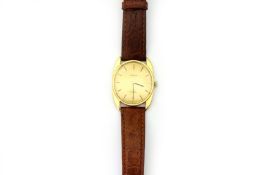 A Gentleman’s Omega 18ct gold wristwatch, No 111083, with baton numerals, leather strap