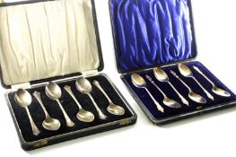Two cased sets of silver teaspoons, Comprising: six apostle spoons, hallmarked Sheffield 1964 and
