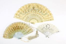 Three 20th century decorative fans comprising two bridal fans, the first decorated with sequins