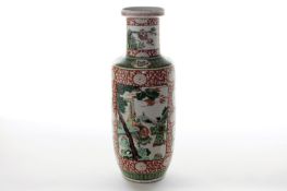 A large 19th century Chinese famille verte vase, decorated with panels of figures in garden