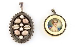 A circular ivory pendant inset with miniature of a lady in blue gown in marquasite frame, together