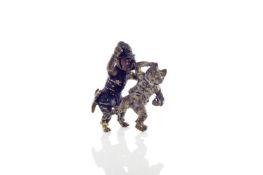 An Austrian novelty cold painted bronze, circa 1900, depicting an amusing figure of a dog dressed as