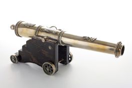 A Maltese silver model of a cannon, late 19th century, the barrel of silver construction with