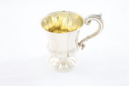 A William IV silver christening mug, hallmarked London 1835, the body of lobed urn shape with