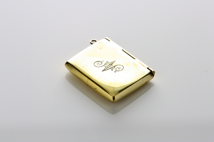 An early 20th century silver gilt stamp case in the form of an envelope, hallmarked Birmingham,