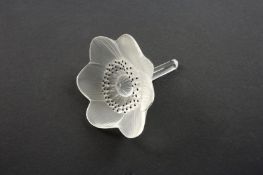 A Lalique frosted glass flower head, mid 20th century with black enamel decoration, signed