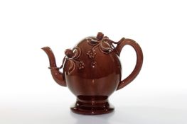 A Spode Cadogan teapot, circa 1830, with treacle brown glaze, height 19cm