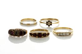 Five various rings, including a five stone garnet ring, a five stone diamond ring, a 19th century