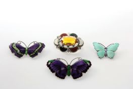 Three enamel butterfly brooches stamped on the back silver and with makers initials JA & S, together