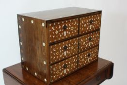 An Anglo Indian table top chest of drawers late 19th century, comprising two short and two long