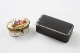 A German porcelain pill box early 20th century, of oval form with gilt painted scroll border