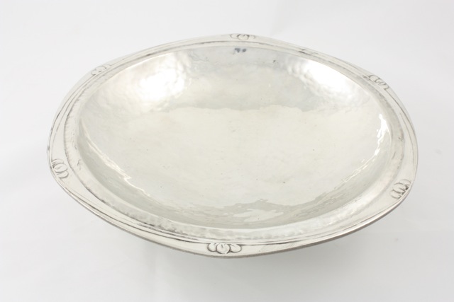 A Liberty & Co `Tudric` pewter fruit bowl designed by Archibald Knox circa 1905, of circular form