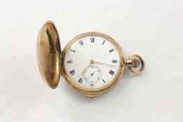 A 9ct gold hunter pocket watch English, circa 1920, with white enamel dial, Roman numerals, together