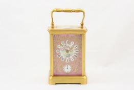 A porcelain mounted carriage timepiece with alarm French, late 19th century, the gilt painted dial