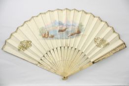 An early 19th century hand painted and ivory fan with pierced ivory sticks, and hand painted scene