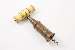 A Thomason-type dual action corkscrew circa 1840, with bone handle, and bronze barrel with gilded