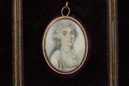 An oval portrait miniature on ivory of Mary Winbolt late 18th century, mounted in a gold locket