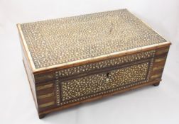 An Anglo Indian inlaid bone and brass mounted ladies dressing casket late 19th century, the hinged