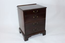 A mahogany small chest of drawers probably late 19th century, originally set with four drawers,