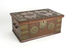 A small Anglo Persian brass mounted and studded chest circa 1900, the hinged top opening to reveal a