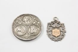 A silver hockey medal dated 1908 hallmarked Birmingham 1907/08, with makers initials WHH, the