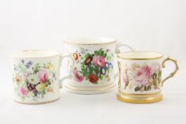 A large hand painted frog mug 19th century, the outside with brightly painted flowers, and the