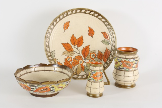 A Charlotte Rhead Crown Ducal Charger 1930s, with tube lined decoration depicting stylised leaves