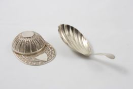 A Georgian silver caddy spoon with scalloped bowl, together with a Jockey cap caddy spoon,