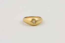 A gentleman`s 18ct gold gypsy ring set with centre `old mine` diamond, in star setting