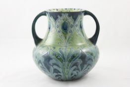 A large Moorcroft Florian Ware `Tulip` two handled vase English, circa 1898, the stylised tulips and