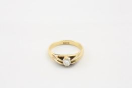 A gentleman`s 18ct gold and diamond gypsy ring set with a single diamond approximately a 1/4 ct In