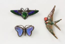 A Charles Horner enamelled silver brooch hallmarked Chester 1908/9, depicting a winged insect and