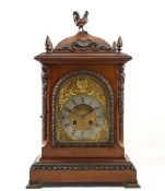 A brass mounted mahogany table clock circa 1900, inscribed on dial HOWELL & JAMES TO THE QUEEN