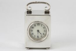 A miniature silver carriage clock by Goldsmiths and Silversmiths Company hallmarked London 1903/4,