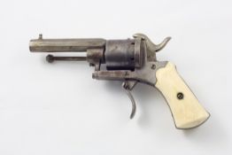 A pin fire revolver mid-late 19th century, 5mm with ivory handle, width 12.5cm Appears to be in good